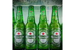 Green beer bottles in fridge.